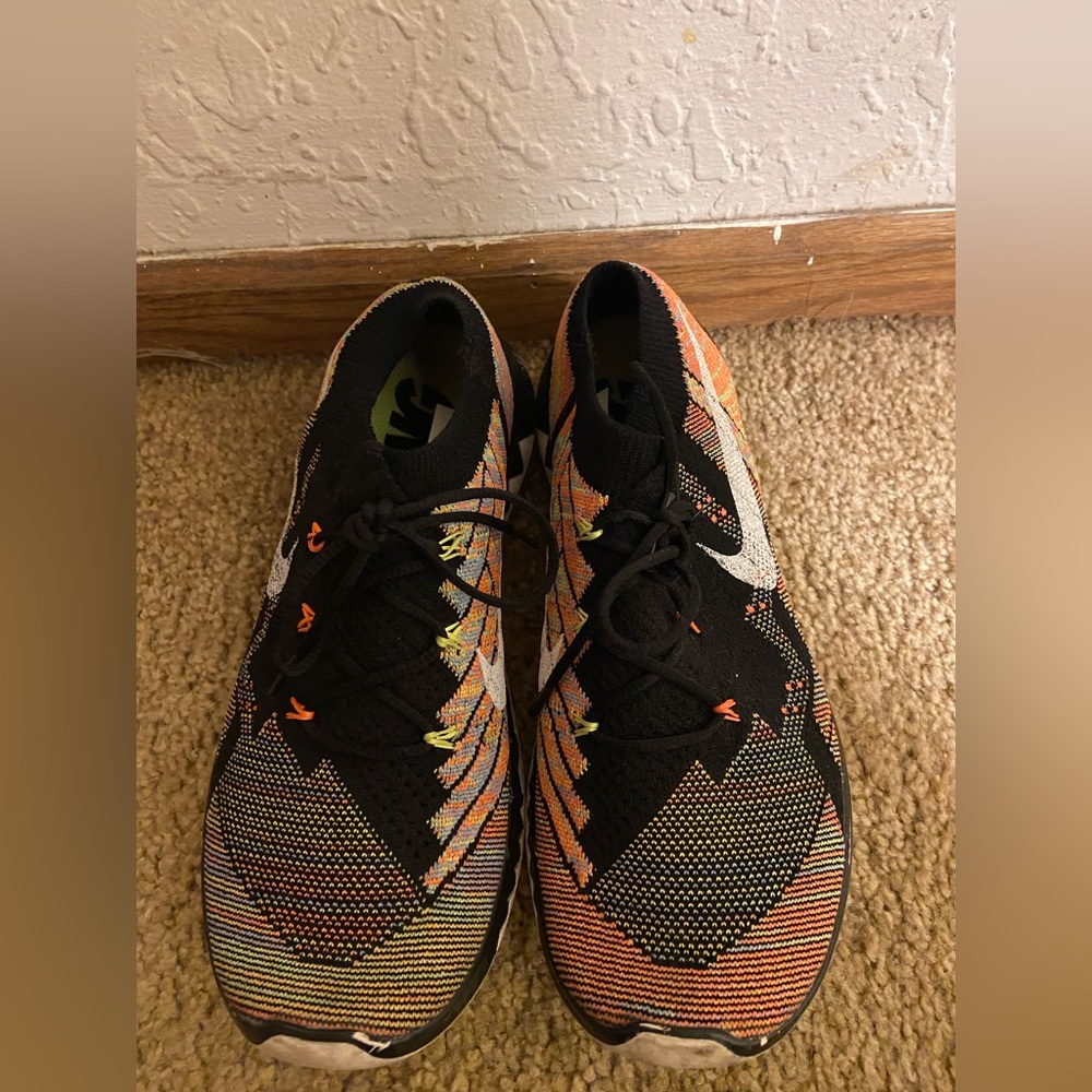 Selling these Nike neon barefoot shoes